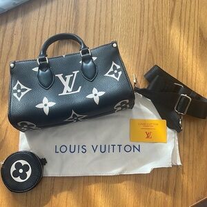 Louis Vuitton handbag with coin purse and strap